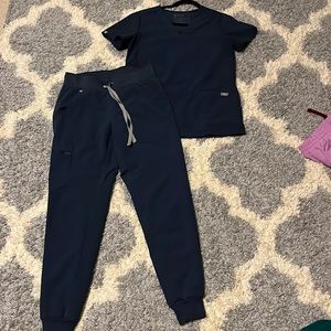 Figs scrubs Zamora jogger pants in XS and Casma three pocket top in XS.